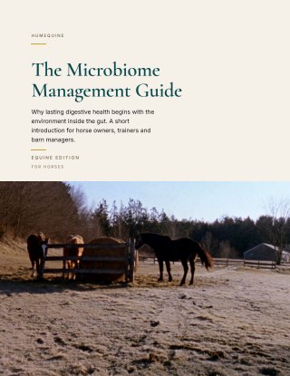 Cover of The Microbiome Management Guide, Equine Edition, with horses at a round bale in a winter paddock